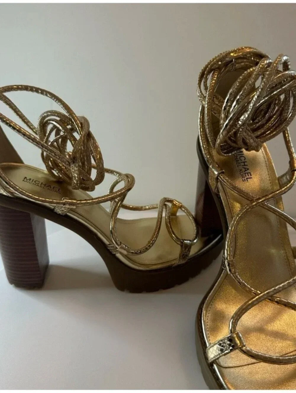 Michael Kors Vero Lug Platform Sandals in a metallic gold finish. Size 7.5